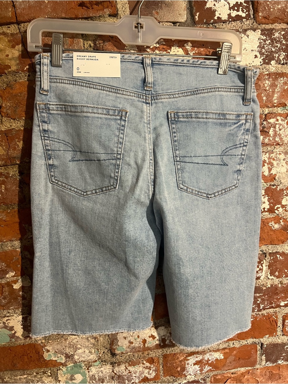NWT**Women’s DREAMY DRAPE BAGGY BERMUDA Light Wash Denim shorts Size 0  25w